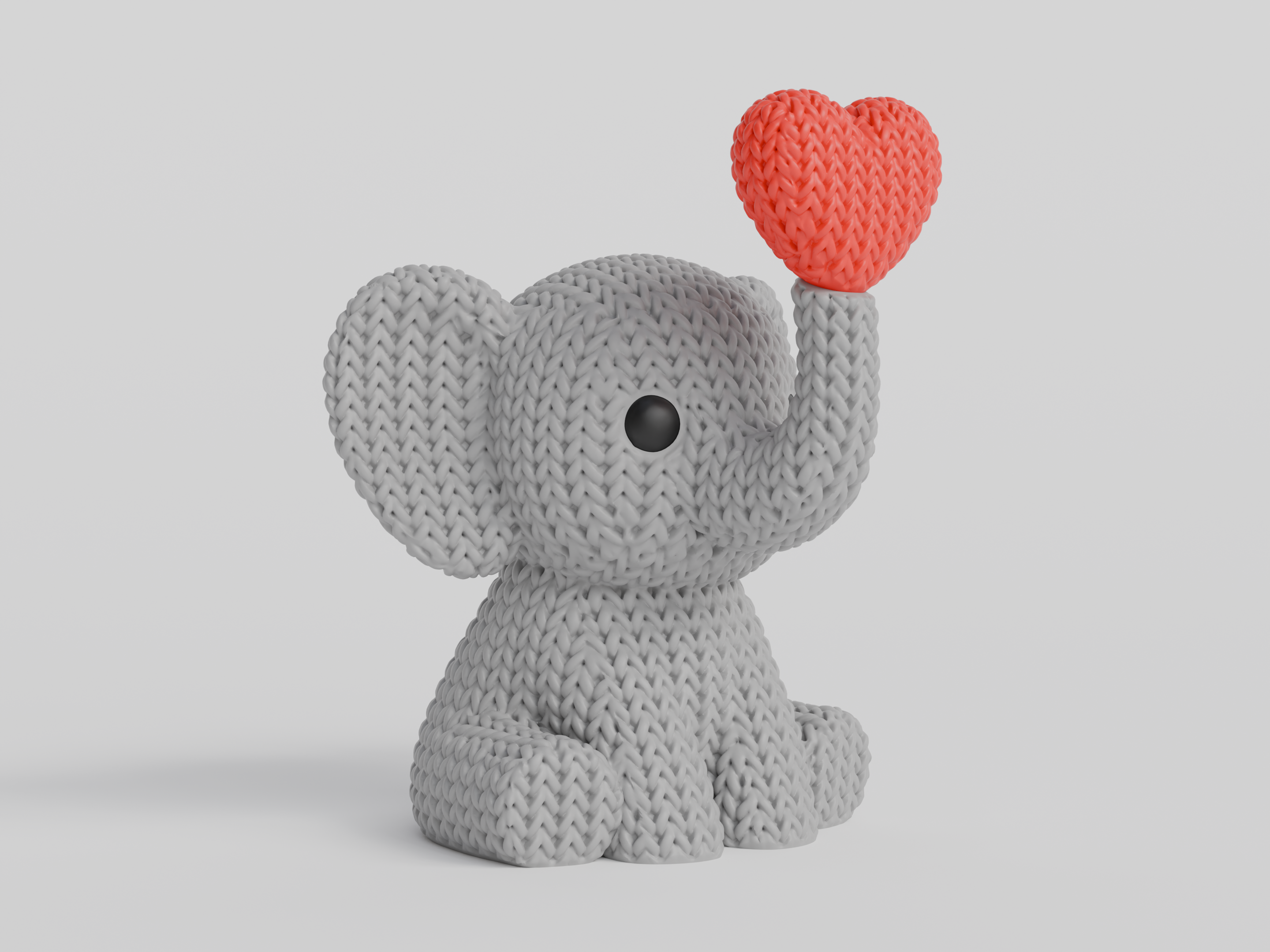 Knitted Elephant Blowing Heart